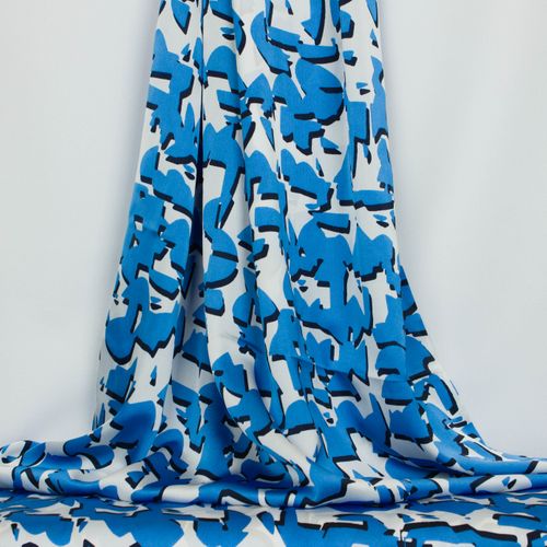 Satijn polyester wit met abstracte blauwe figuren